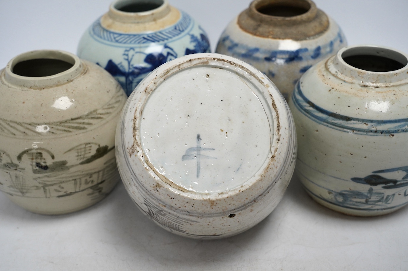 Five 18th/19th century Chinese blue and white ginger jars and two ‘pagoda’ models, tallest 26cm. Condition - fair